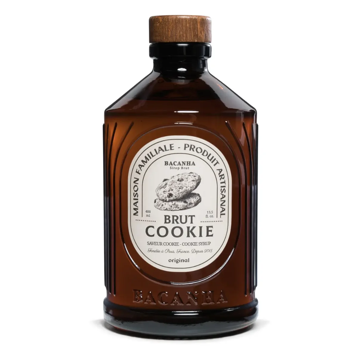 Cookie Sirup in brauner Glasflasche mit Holzverschluss und Etikett, Frontansicht