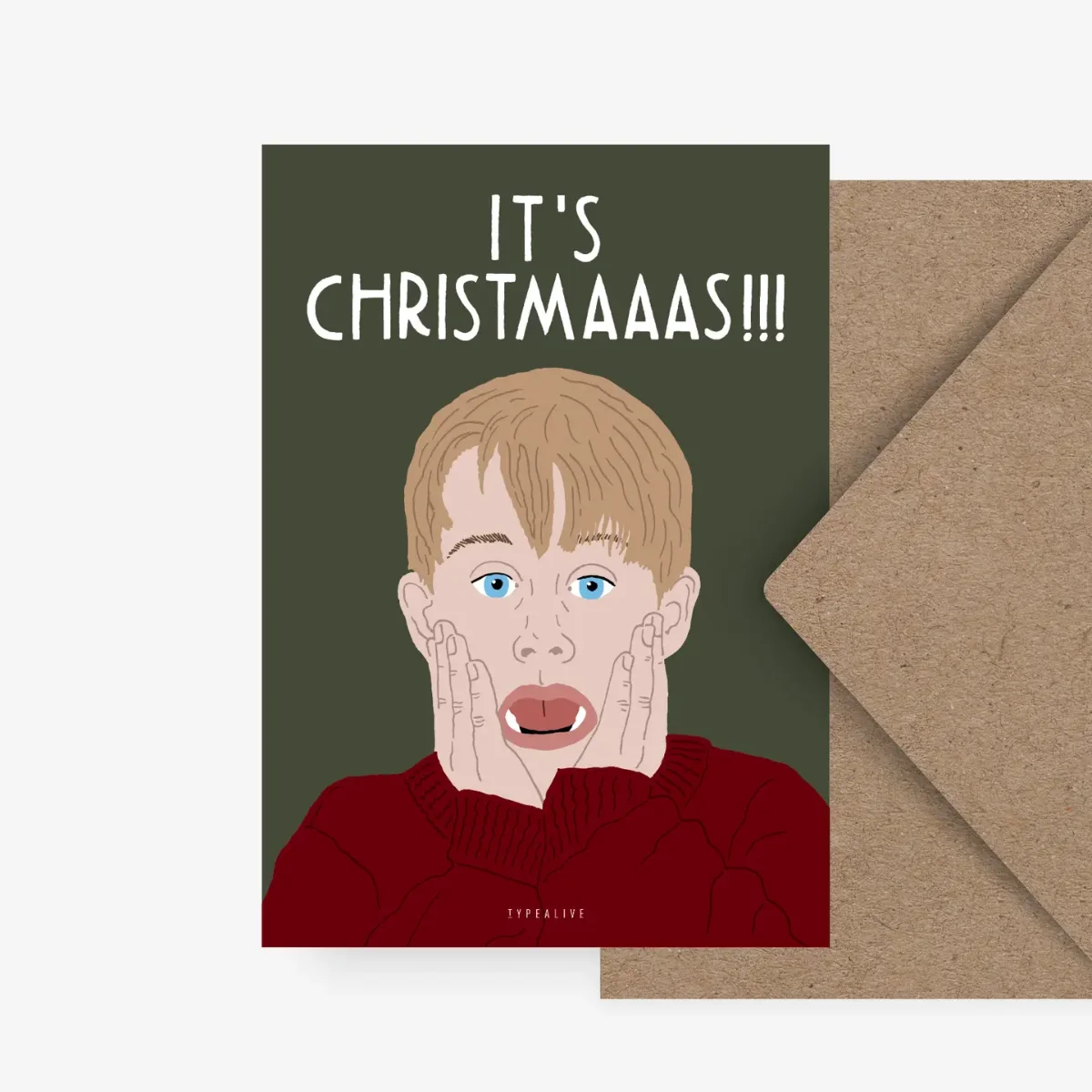 Weihnachtskarte mit Illustration eines überraschten Jungen in rotem Pullover auf dunkelgrünem Hintergrund, Text „IT'S…