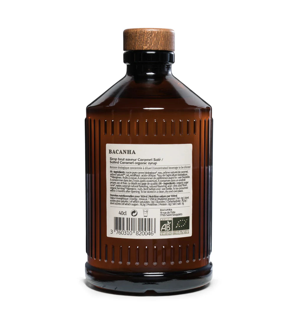 Braune Glasflasche mit Holzverschluss, Rückseite mit Etikett, Bio-Siegel und Barcode sichtbar.