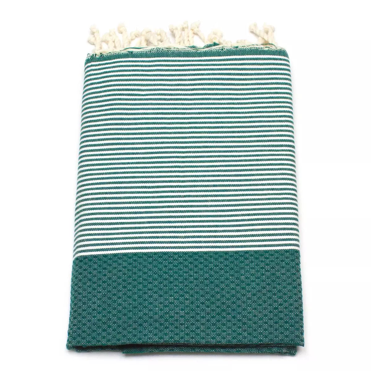 Grün-weiß gestreiftes Fouta mit Wabenmuster unten, oben cremefarbene Fransen, flach ausgebreitet.